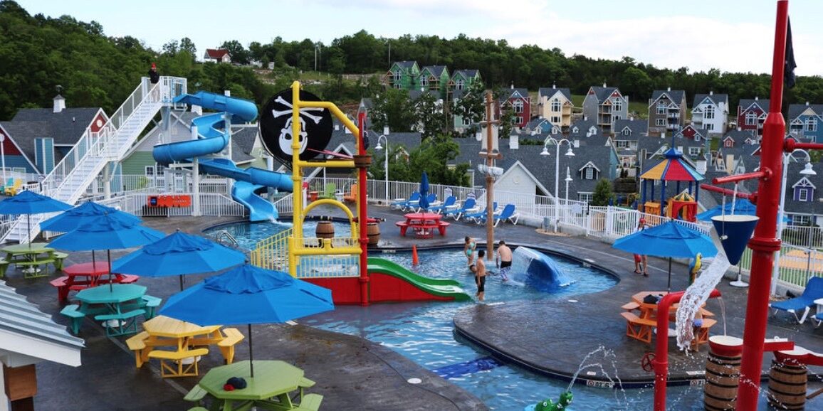 A water park with many slides and pools.